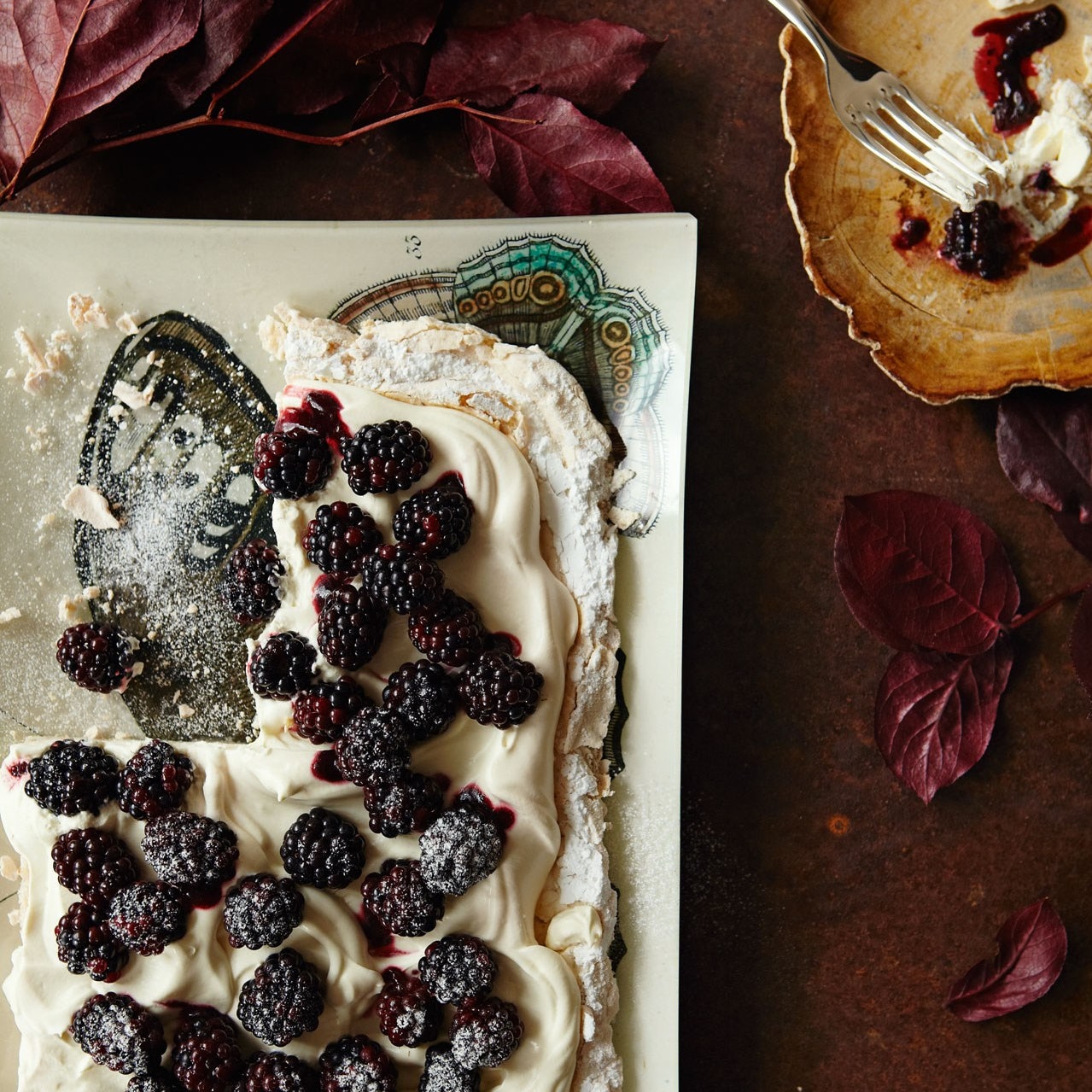 Soft walnut meringue with blackberries