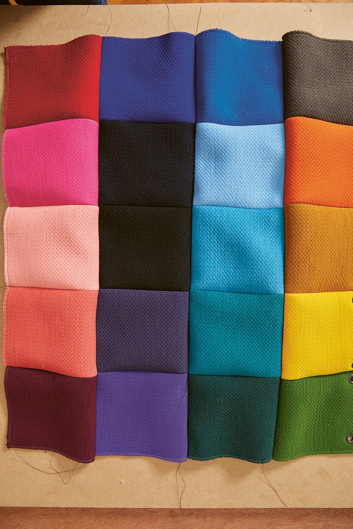 Image may contain Blanket Accessories Formal Wear and Tie