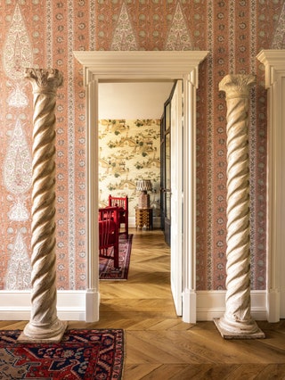 Walls in Braquenis ‘Kalamkar in ptale from Pierre Frey and painted wood Solomonic columns found in a local antique shop...