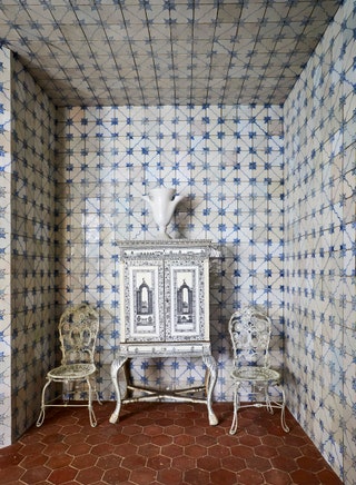 Image may contain Floor Indoors Interior Design Chair Furniture Flooring and Tile