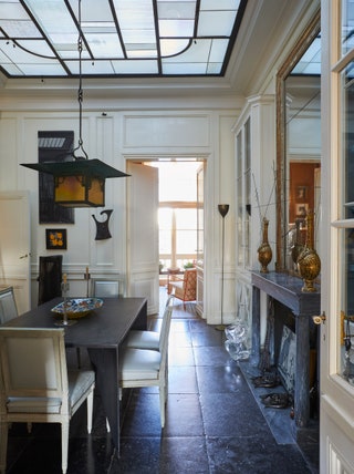 Image may contain Architecture Building Dining Room Dining Table Furniture Indoors Room Table and Floor