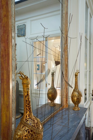 Image may contain Jar Indoors Interior Design Pottery Vase Window Person and Windowsill